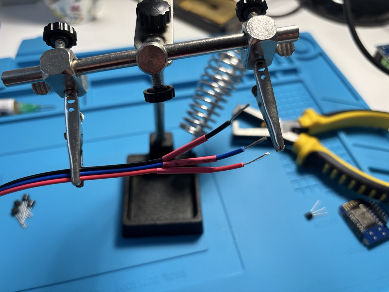 Wires prepared to be soldered to DS18B20 sensor